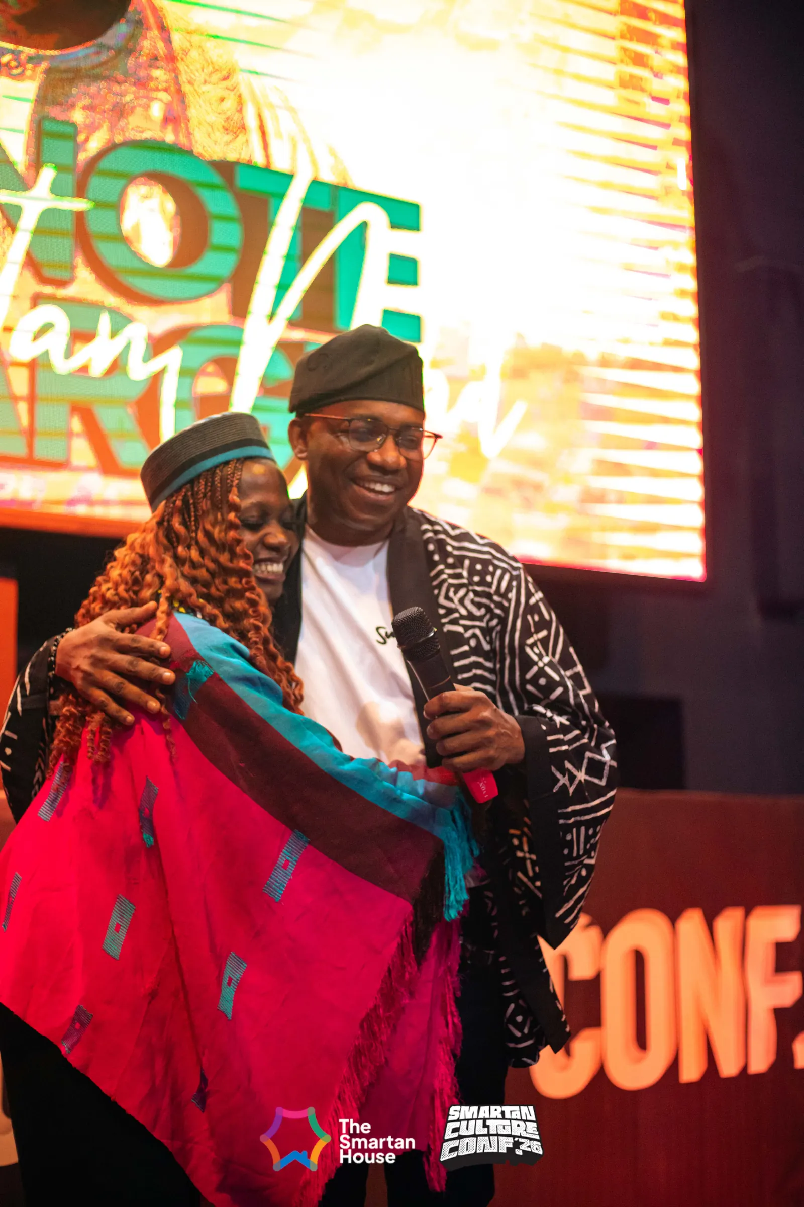 Johnson Abbaly connecting with a young person at a gathering
